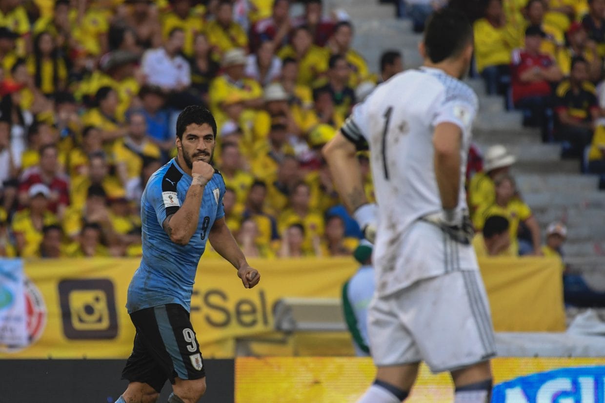 Uruguay's Luis Suarez celebrates after scoring against Colombia during their Russia 2018 World Cup football qualifier match in Barranquilla, Colombia, on October 11, 2016. / AFP / Luis Acosta (Photo credit should read LUIS ACOSTA/AFP/Getty Images)