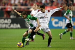 Real Betis' Alberto Rivera and Sevilla FC's Gonzalez Jesus Navas battle for the ball