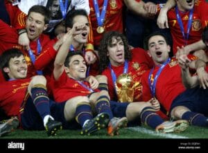 (left to right) Spain's David Silva, Xabi Alonso, Gonzalez Jesus Navas, Francesc Fabregas, Carles Puyol and Hernandez Xavi celebrate victory with the world cup trophy