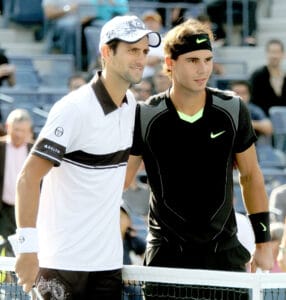 Novak Djokovic of Serbia and Rafael Nadal of Spain pose before the men's final match against Rafael Nadal of Spain on Day 15 of the 2010 US Open in Flushing, Queens. The match had been postponed due to rain and had to be stopped again after today's second