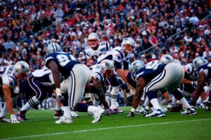 Quarterback Tony Romo, #9 of Dallas Cowboys, passes football at Gillette Stadium, the home of Super Bowl champs, New England Patriots, NFL Team play against Dallas Cowboys,October 16, 2011, Foxborough, Boston, MA