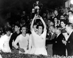 1959 European Cup Real Madrid v Reims Real Madrid's captain Zarraga holds aloft the European trophy after they had beaten Reims 2-0 in the final. 8th June 1959