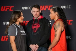 LAS VEGAS, NV - FEBRUARY 7: Julianna Pena (L) and Amanda Nunes (R)  face-off for the press to discuss the upcoming season of TUF on ESPN+ at UFC Apex for UFC - The Ultimate Fighter - Season 30 on February 7, 2022 in Las Vegas, United States. (Photo by Lou