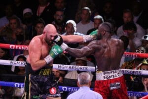 Las Vegas, United States. 10th Oct, 2021. Tyson Fury and Deontay Wilder exchange left jabs in the corner of the ring during the Tyson Fury vs Deontay Wilder III 12-round Heavyweight boxing match, at the T-Mobile Arena in Las Vegas, Nevada on Saturday, Oct
