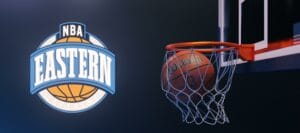 Guilherand-Granges, France - March 03, 2022. NBA basketball. Scoring basket with NBA Eastern Conference logo. Basketball match concept. 3D rendering.