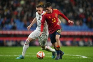 Ardian Ismajli of Albania and Pedro Gonzalez Pedri of Spain during the La Liga match between Spain and Albania played at RCDE Stadium on March 26, 2022 in Barcelona, Spain. (Photo by Pressinphoto / Icon Sport)