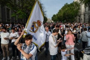 Spanish football team Real Madrid fans celebrate the 2021/22 LaLiga Santander championship after achieving mathematically its 35th trophy at the Cibeles plaza. (Photo by Miguel Candela / SOPA Images/Sipa USA)