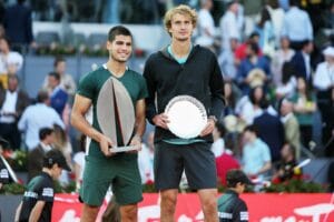 Carlos Alcaraz of Spain with the champion trophy and Alexander Zverev of Germany with the runner up trophy, Final Men's ATP match during the Mutua Madrid Open 2022 tennis tournament on May 8, 2022 at Caja Magica stadium in Madrid, Spain - Photo Laurent La
