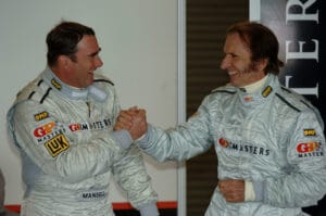 Motor Sport - The GP Masters of Great Britain - Silverstone. Great Britain's Nigel Mansell and Brazil's Emerson Fitipaldi