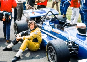 Jackie Stewart with his car before the 1970 British Grand Prix. Image shot 07/1970. Exact date unknown.