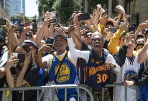 San Francisco, United States. 20th June, 2022. Golden State Warriors fans scream during a parade up Market Street to honor the team's NBA Championship in San Francisco on Monday, June 20, 2022. Photo by Terry Schmitt/UPI Credit: UPI/Alamy Live News