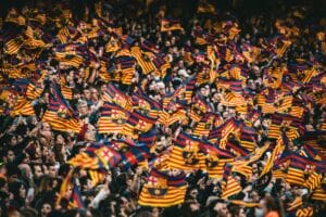BARCELONA - APR 22: Fans waving flags during the UEFA Women's Champions League match between FC Barcelona and VfL Wolfsburg at the Camp Nou Stadium on